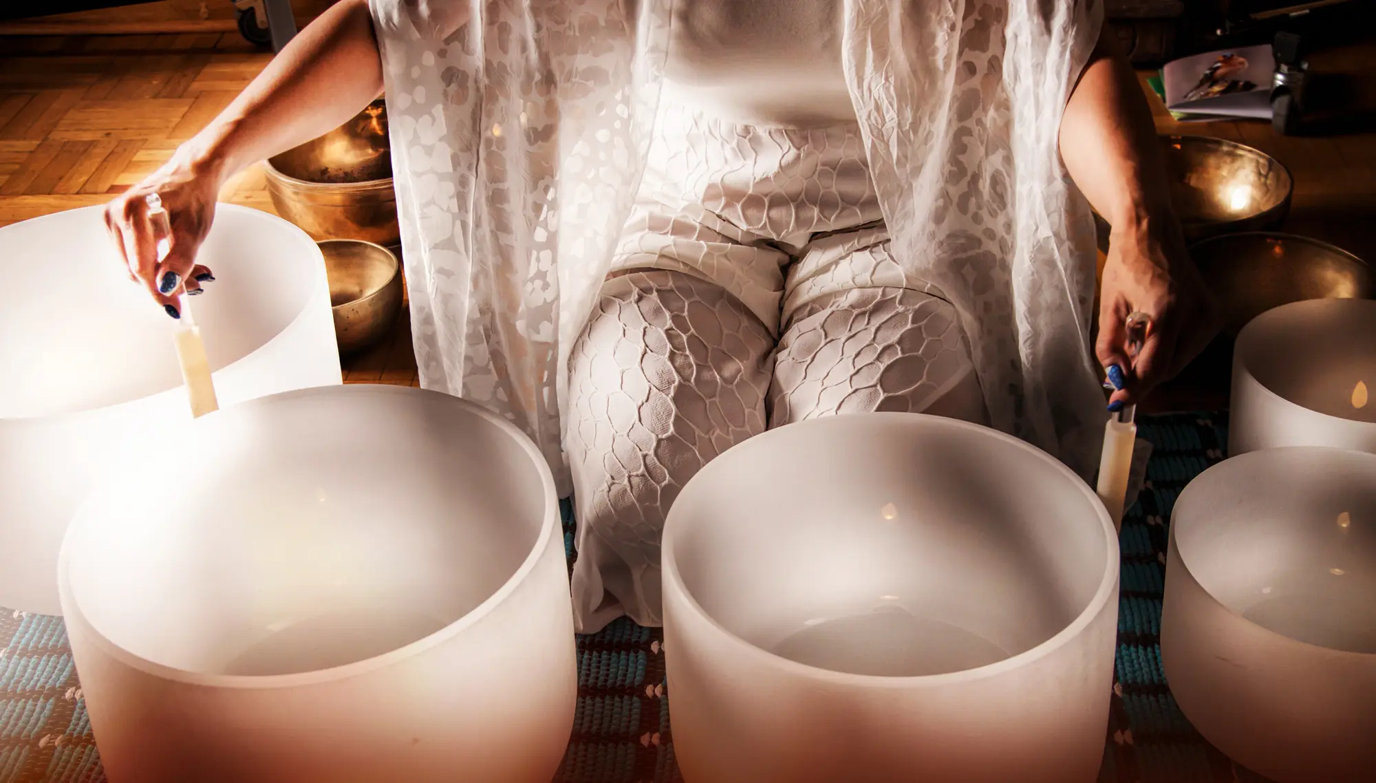 Crafting serene crystal singing bowls, designed for meditation and sound healing experiences.